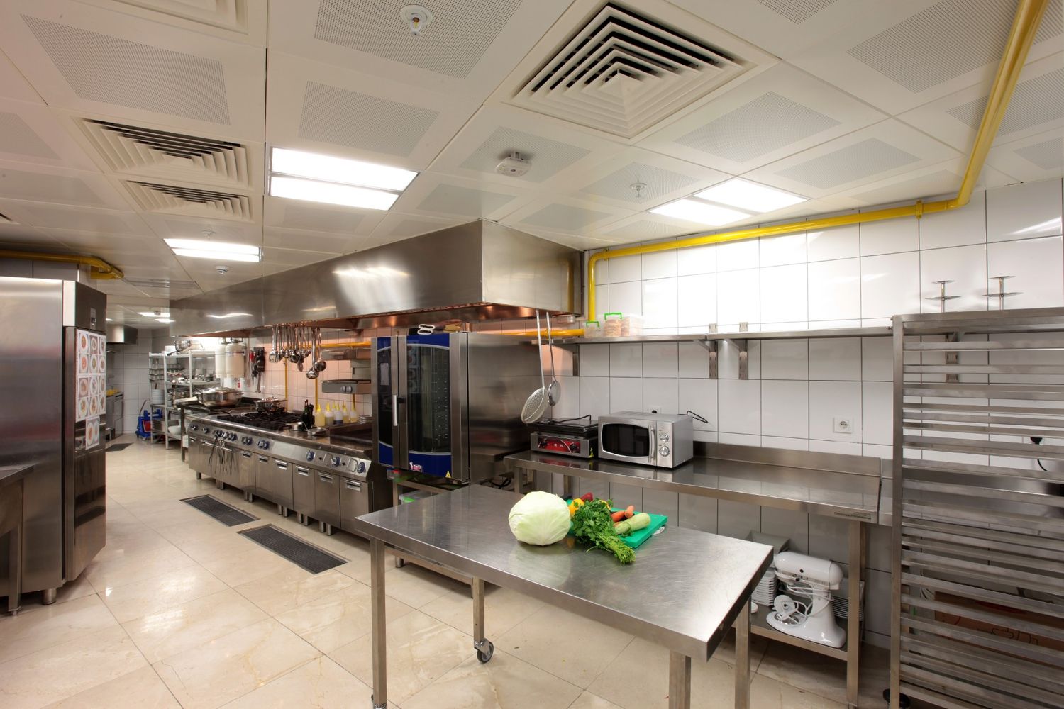 Professional stewarding services in Singapore maintaining a high-capacity luxury hotel kitchen with HACCP-compliant standards.
